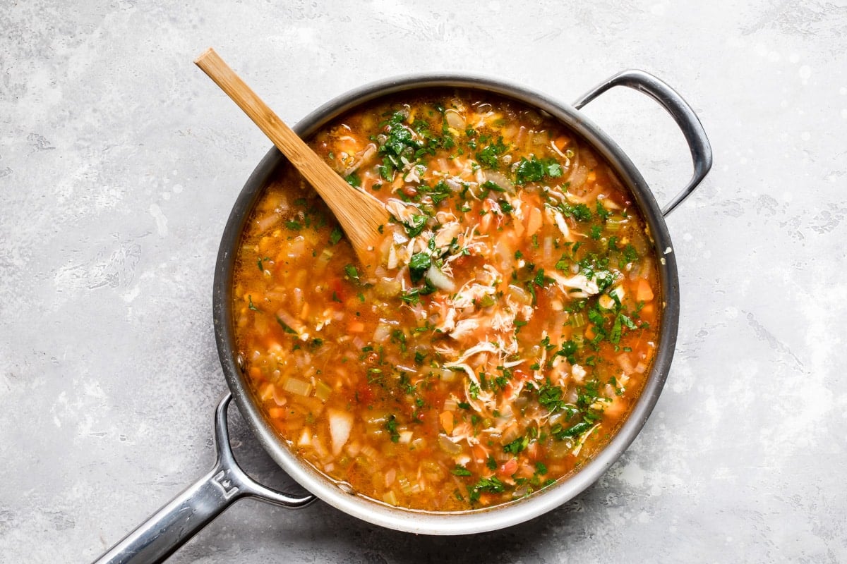 A skillet full of Mexican chicken soup.