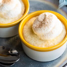Tapicoa pudding in two ramekins on a gray plate.
