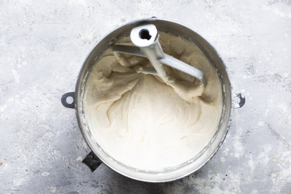 Bunny cake batter in a silver mixing bowl.