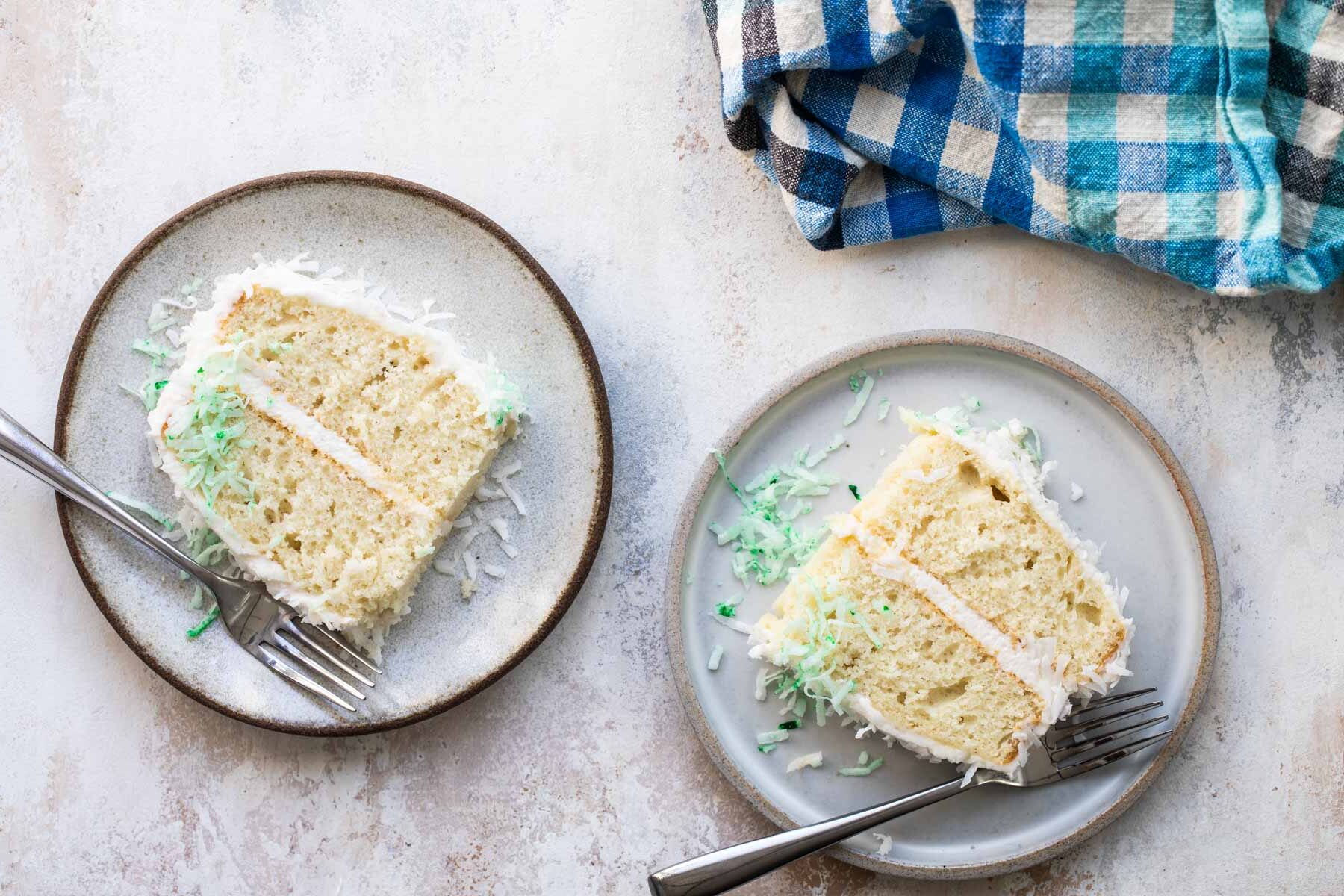 Two plates with slices of bunny cake on them.