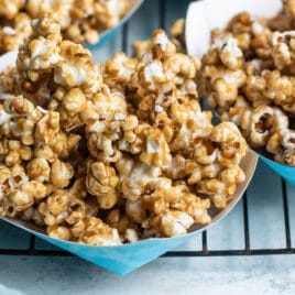 Caramel corn in a paper boat.