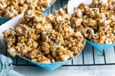 Caramel corn in a paper boat.