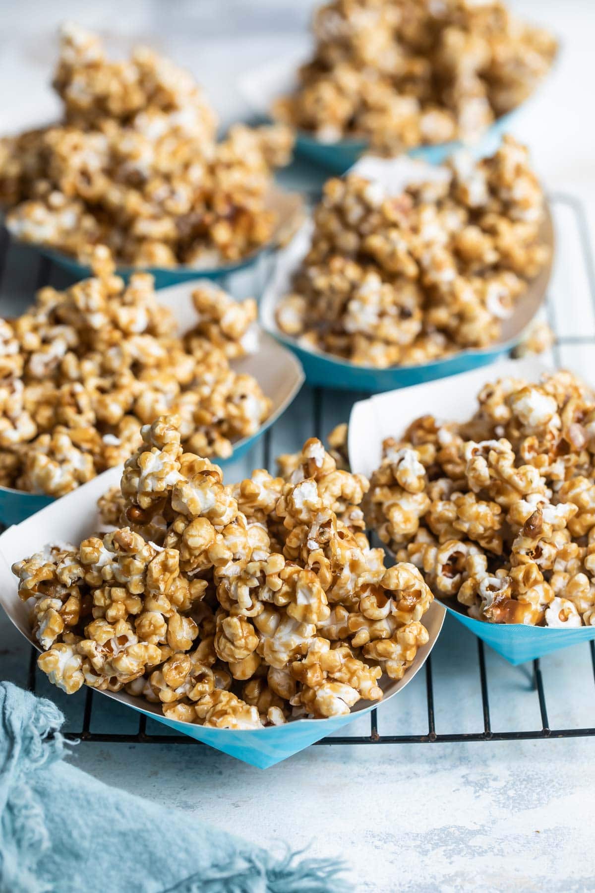 Caramel corn in a paper boat.