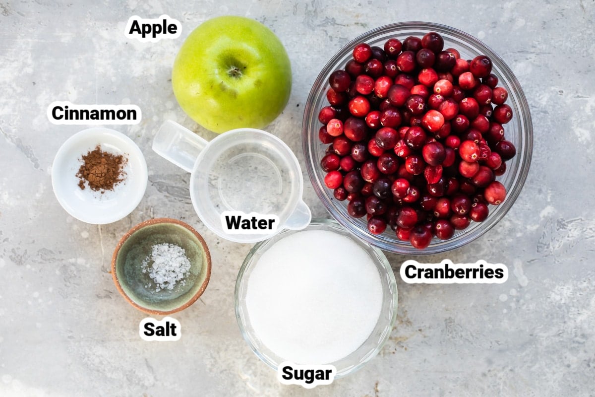 Cranberry Sauce ingredients labeled and in various bowls.