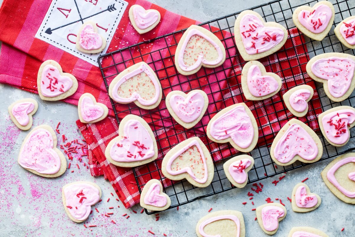 Easy frosted valentine cookies on a cooling rack.