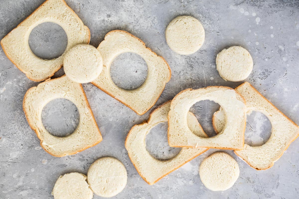 Bread with circles cut out of the middle.