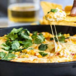 A skillet with hot corn dip.