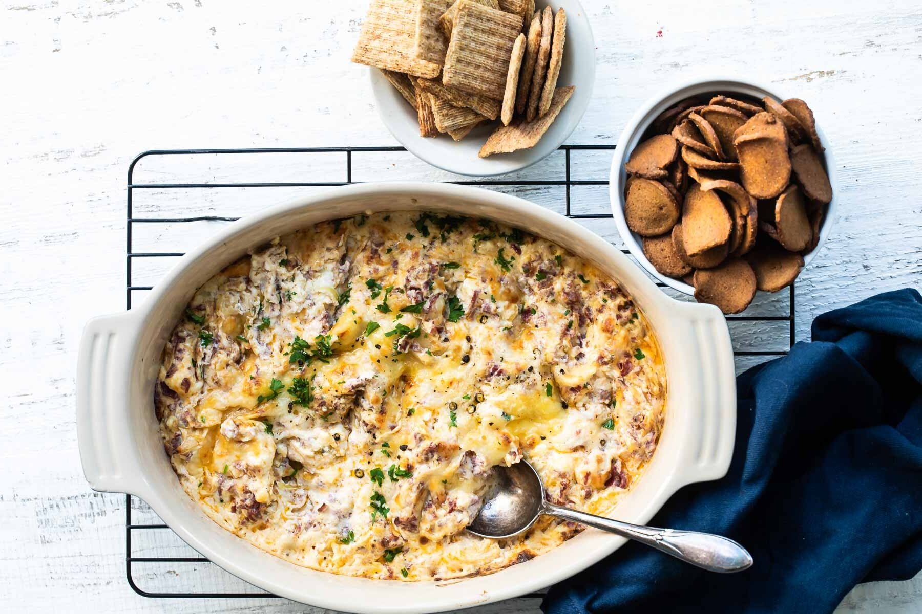Hot reuben dip in a baking dish.