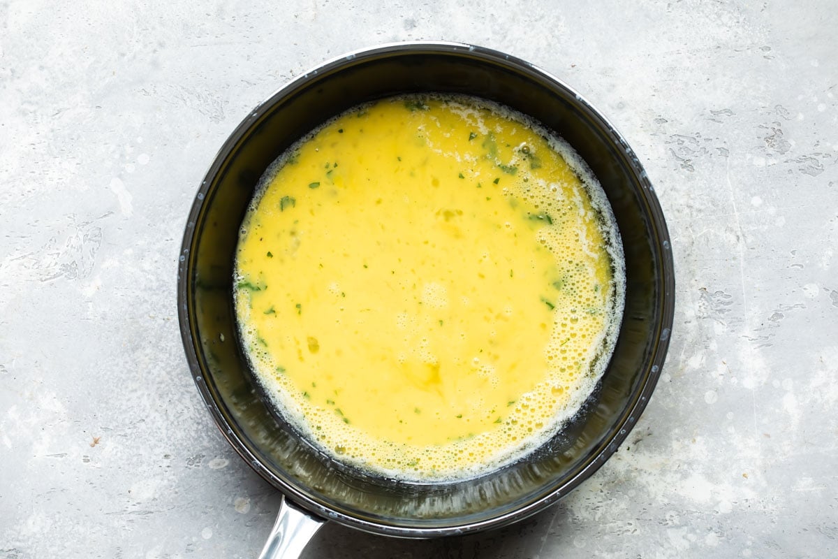 An omelet in a skillet.
