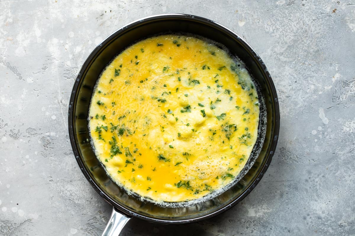 An omelet in a skillet.
