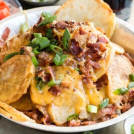 Irish nachos in a silver serving dish.