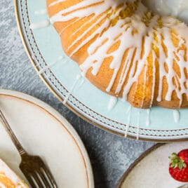 Lemon bundt cake slices on plates.