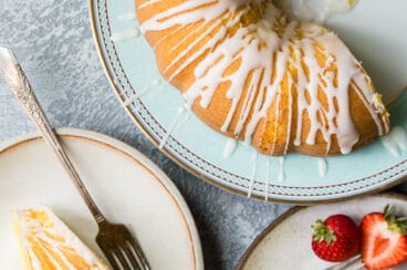 Lemon bundt cake slices on plates.