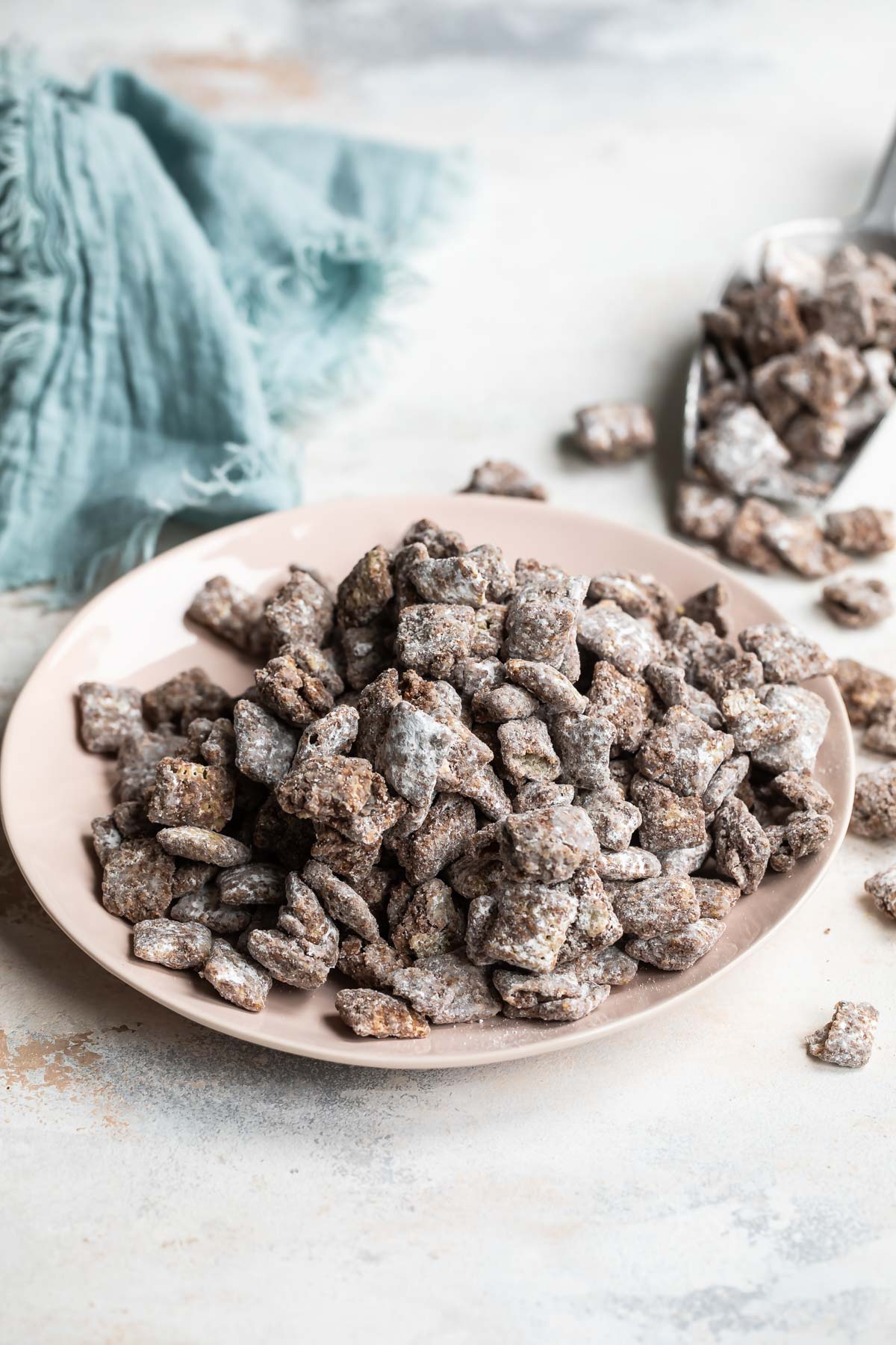Puppy chow on a beige platter.