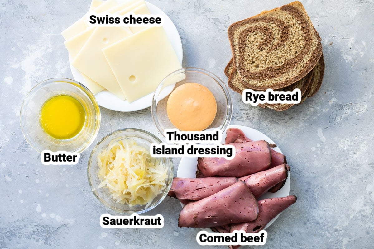 Reuben ingredients in various bowls.