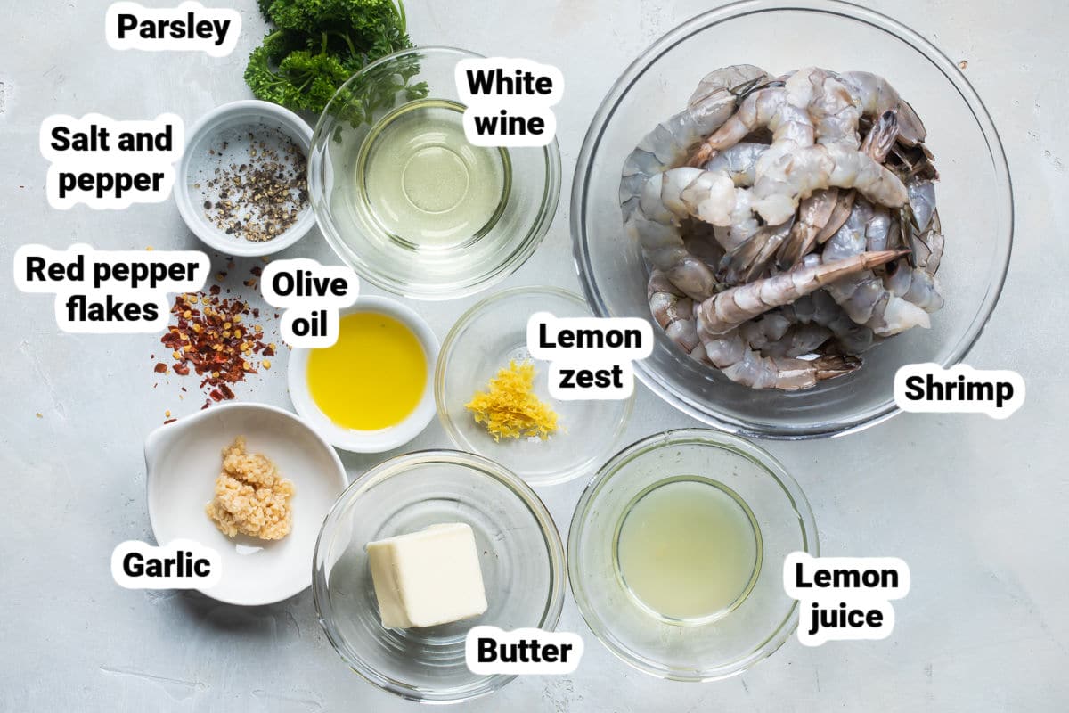 Shrimp scampi ingredients in various bowls.