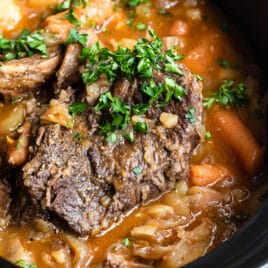 Pot roast in a slow cooker.