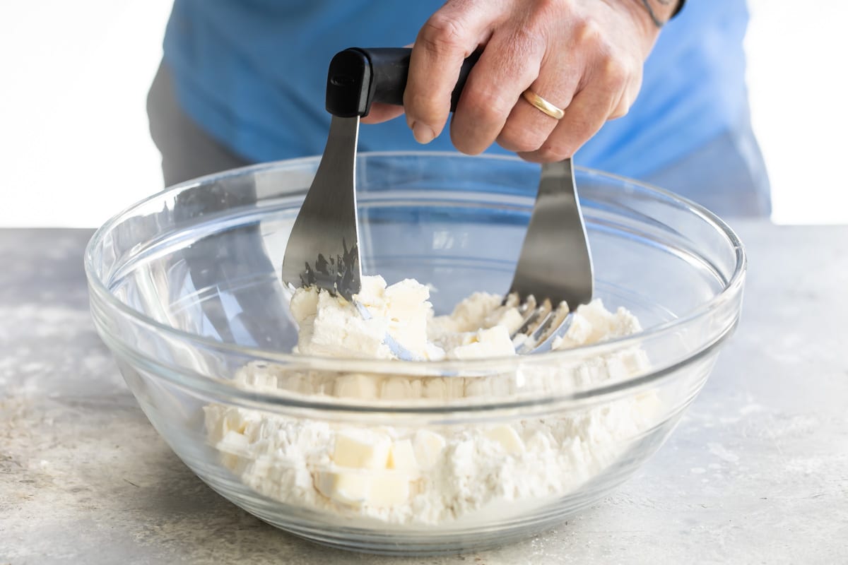 Making biscuit dough in a bowl.