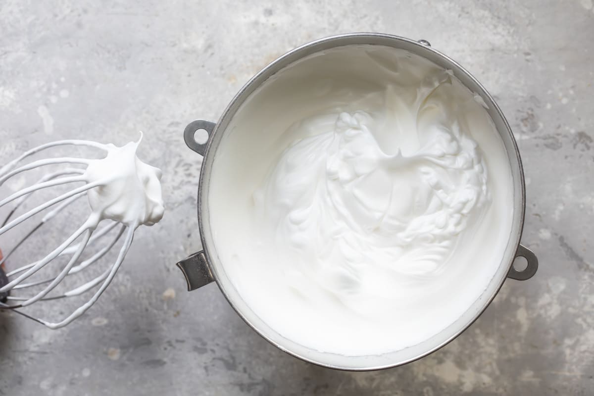 Egg whites and sugar beaten until glossy peaks form.