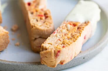 Cherry almond biscotti on a plate.