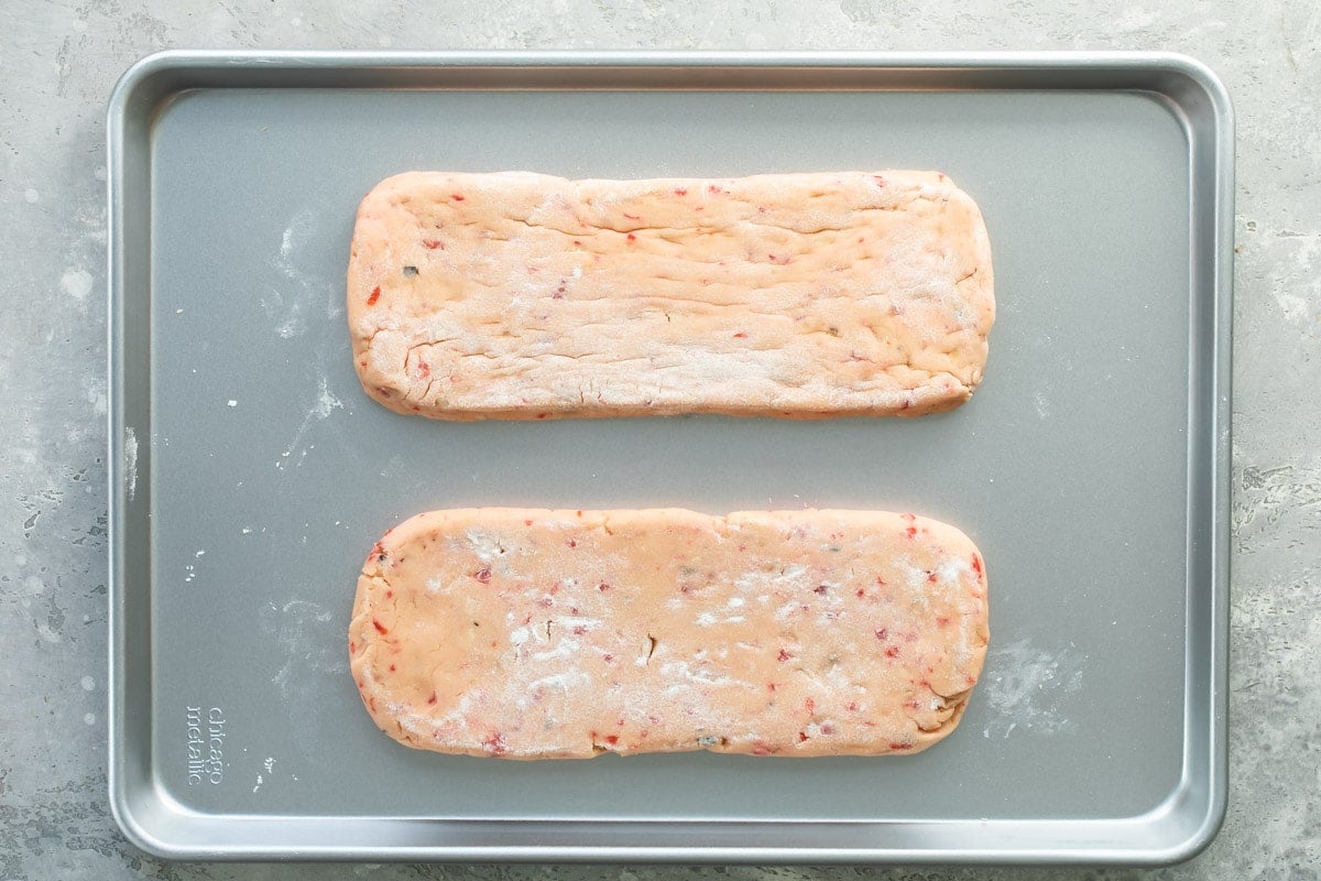 Cherry almond biscotti on a baking sheet before baking.