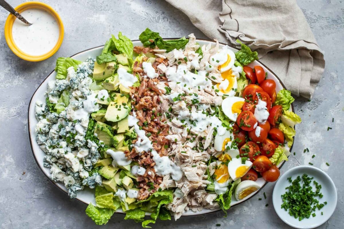 A cobb salad composed on a platter.