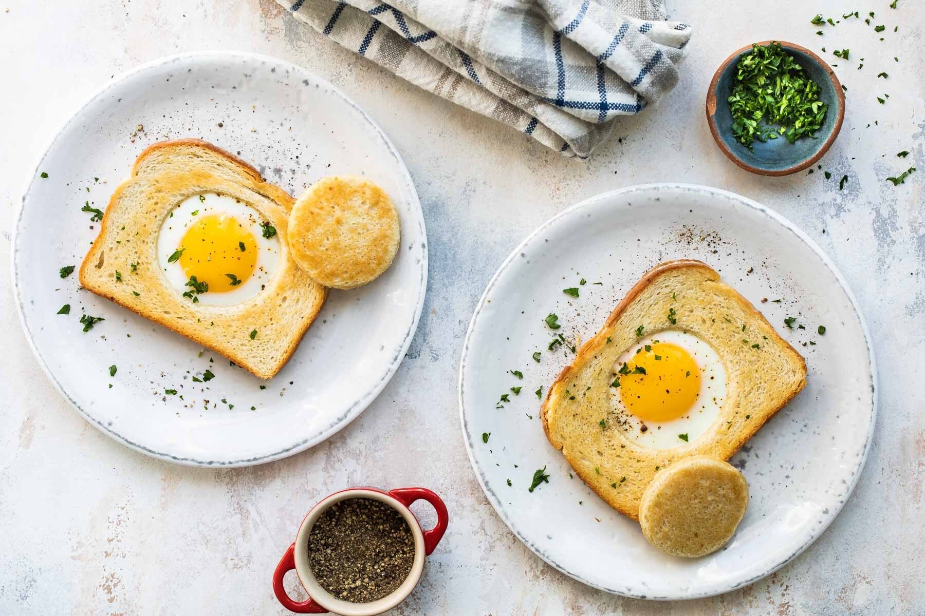 An egg cooked into a piece of bread.