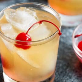 A whiskey sour in a rocks glass.