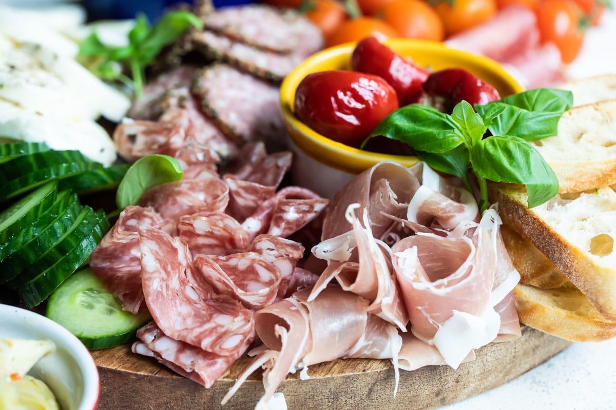 Assorted meats on a serving tray.