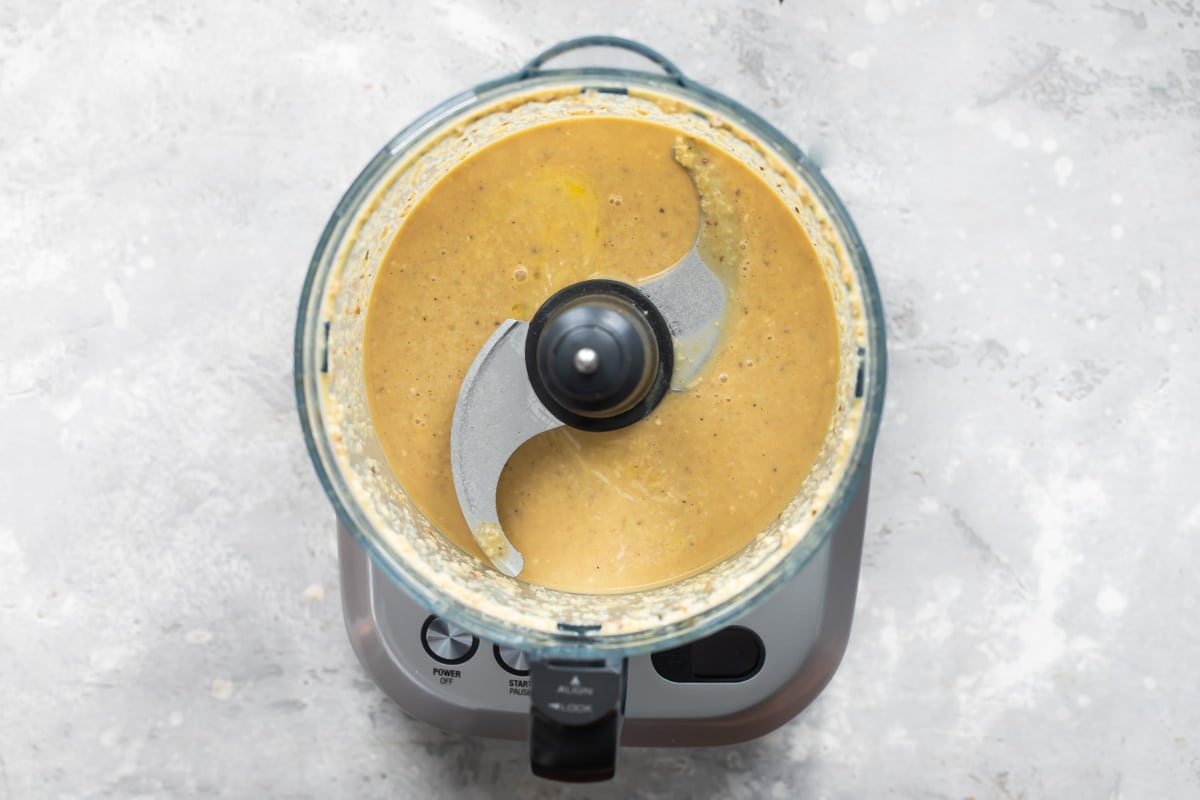 Caesar dressing in a food processor.