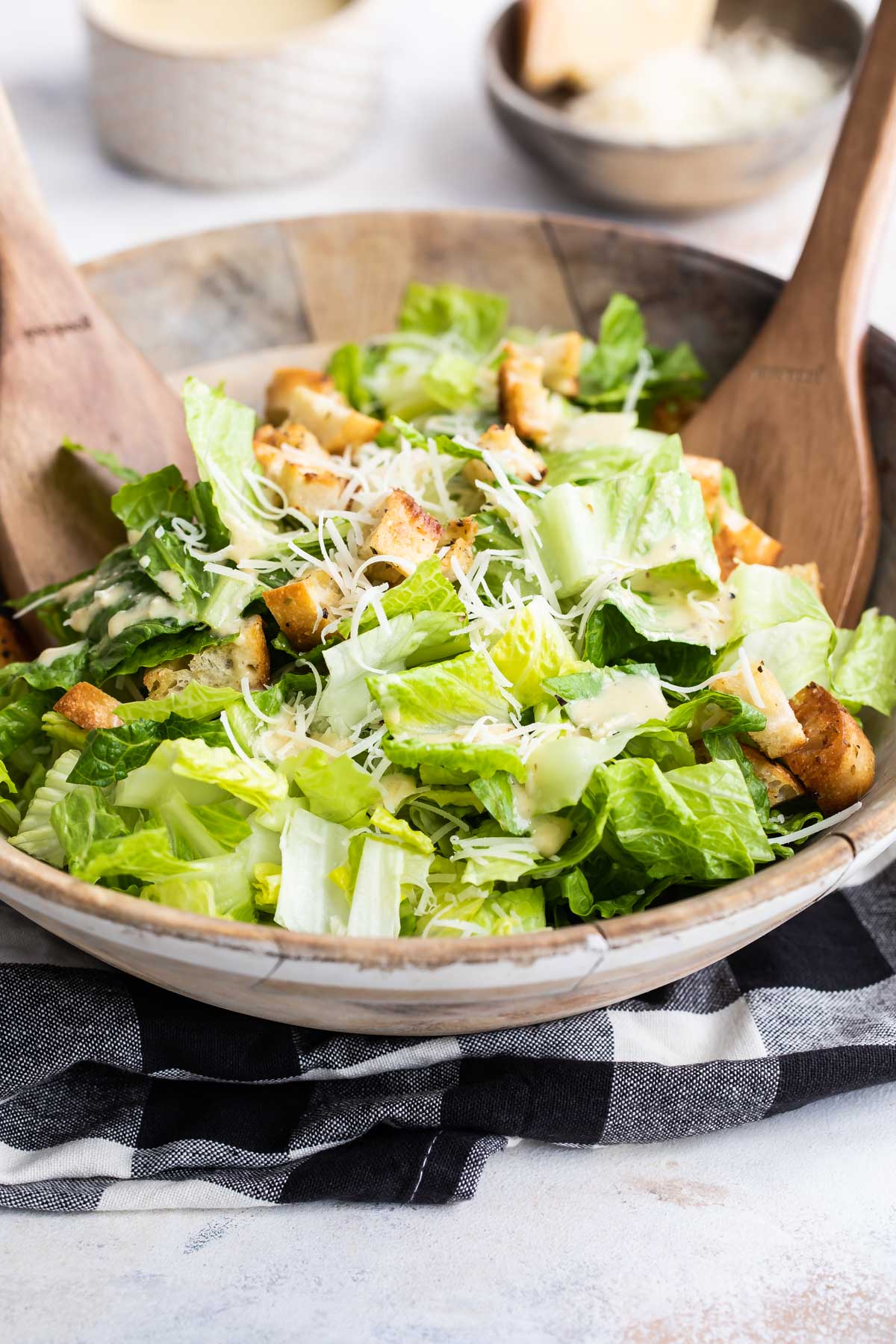 Caesar salad in a wooden bowl.
