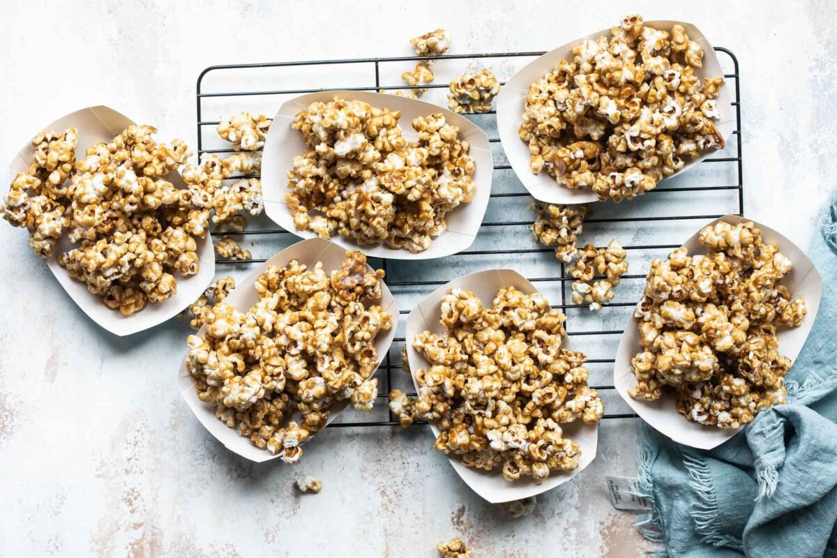 Caramel corn in a paper boat.