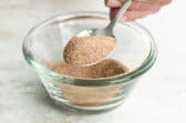 A bowl of cinnamon sugar topping.