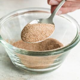 A bowl of cinnamon sugar topping.
