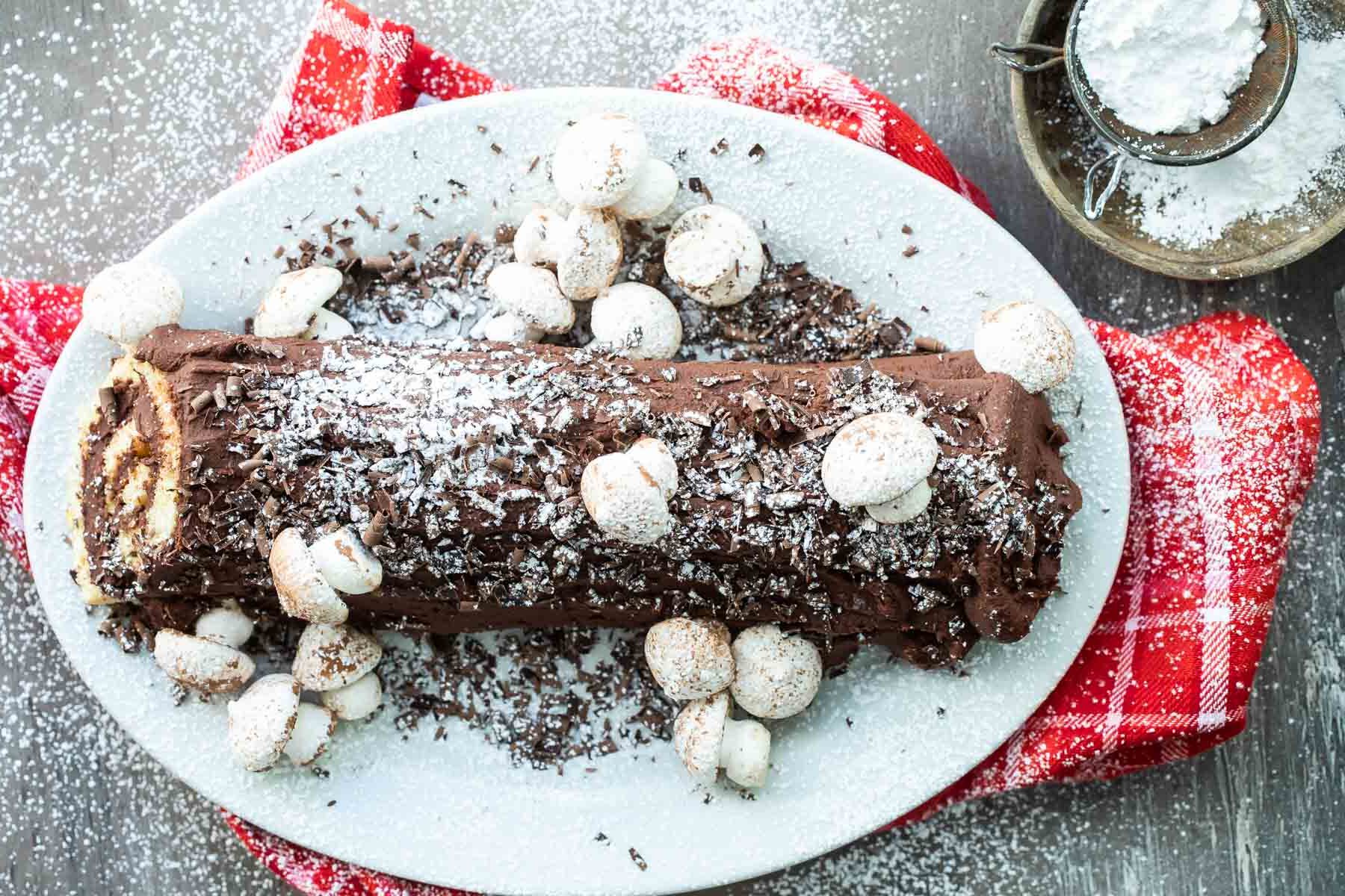 Meringue mushrooms on a Buche de Noel cake.
