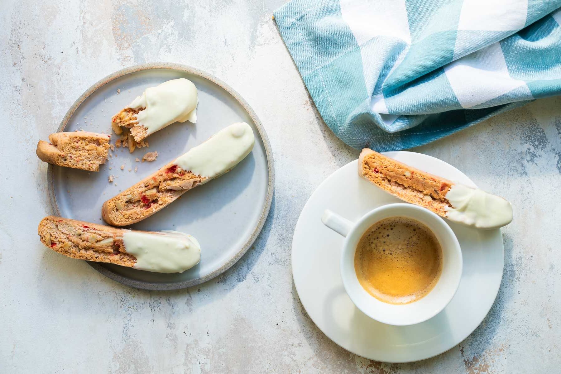 Cherry almond biscotti on a plate.