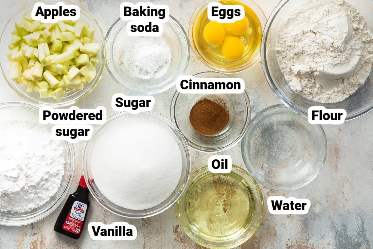 Labeled ingredients for cinnamon apple cake.