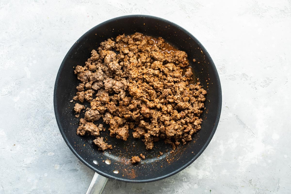 Taco meat in a skillet.