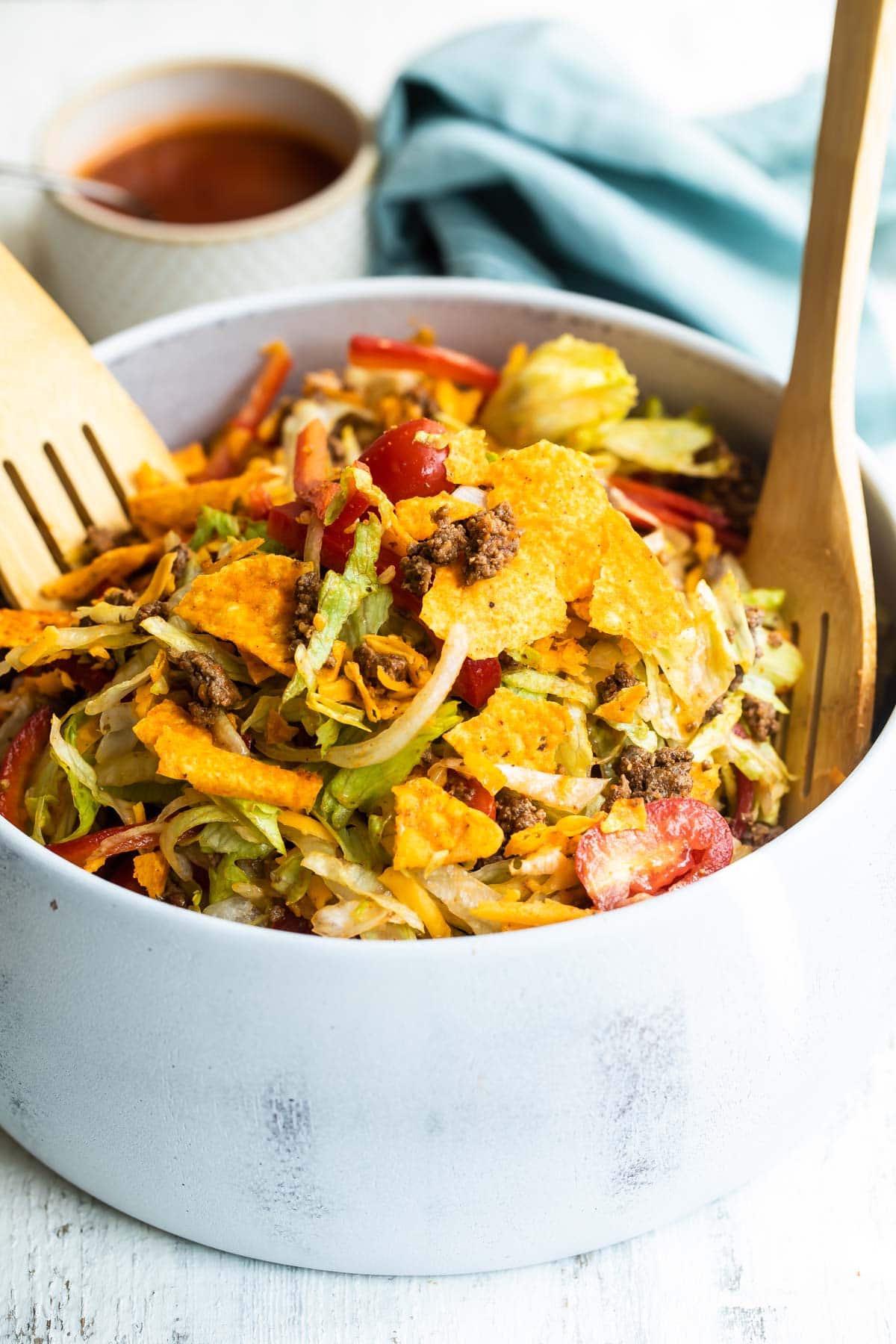 A white bowl filled with Dorito Taco Salad.