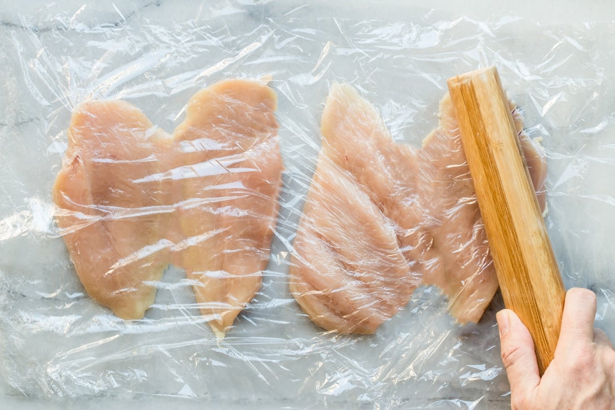 Somebody pounding chicken breasts after butterflying them.