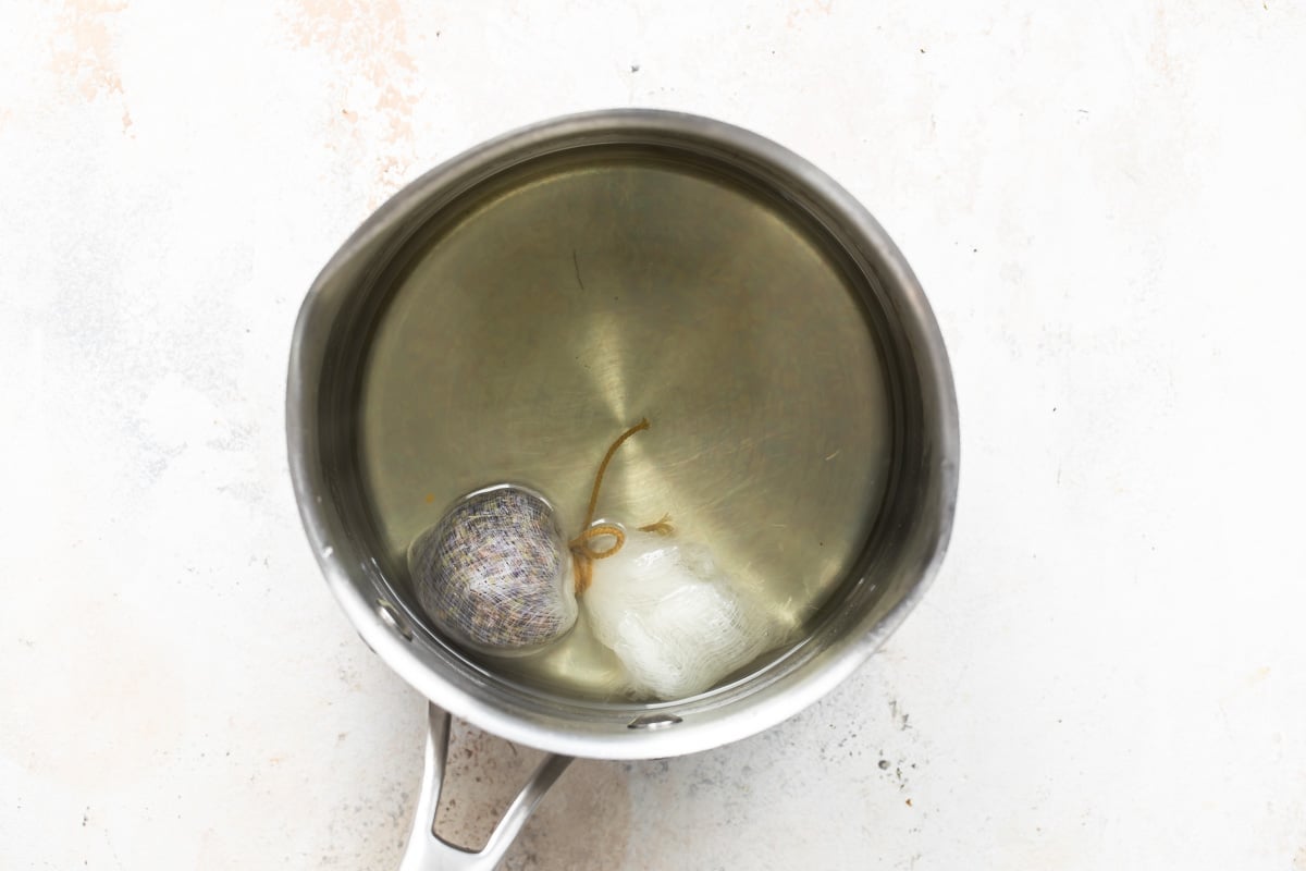 A saucepan with lavender simple syrup.