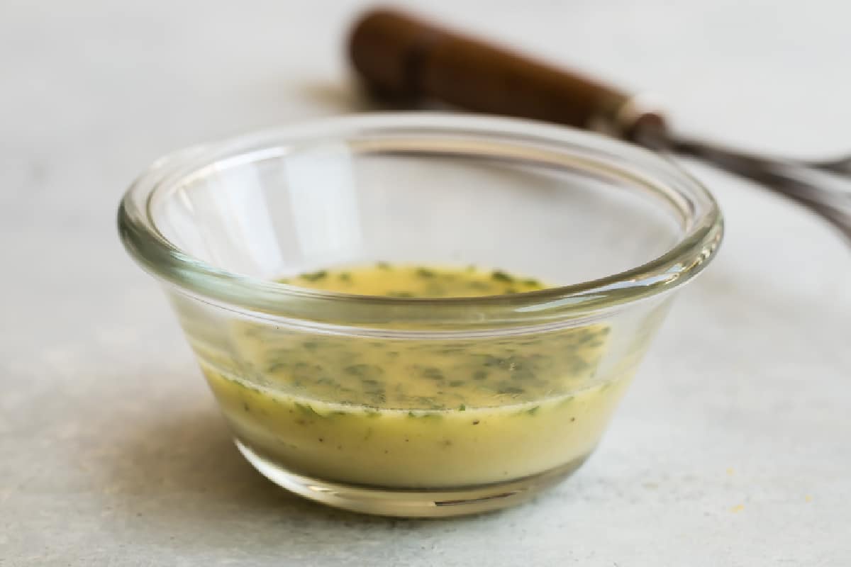 A bowl of lemon vinaigrette.