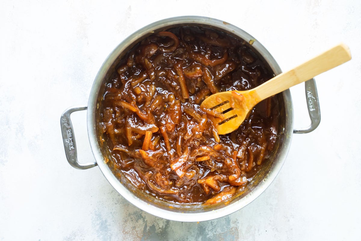 A pot full of finished orange marmalade.