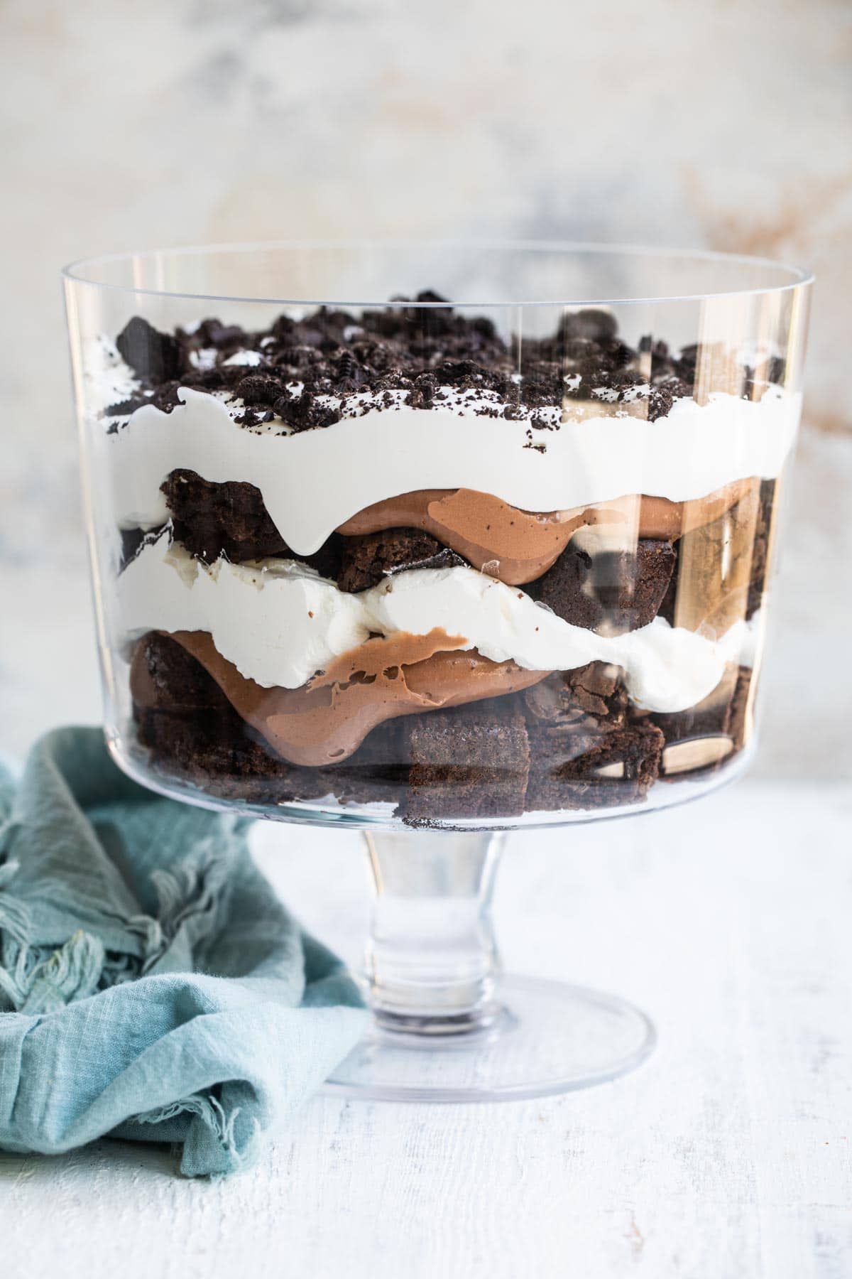 Oreo brownie trifle assembled in a trifle dish.