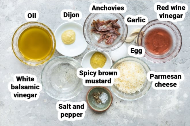 Labeled ingredients for caesar salad dressing.