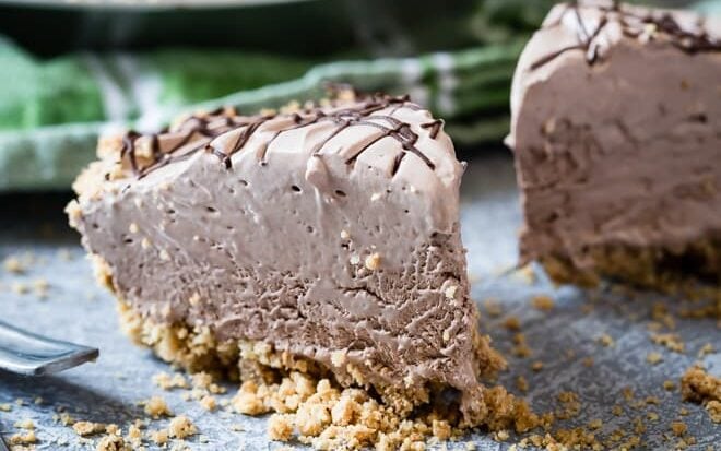 With a homemade graham cracker crust and a creamy, no-bake filling, this frozen Chocolate Cream Pie is the ultimate make-ahead dessert!