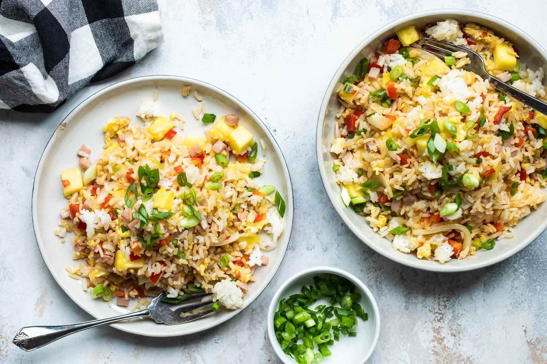 Two bowls full of Hawaiian fried rice.