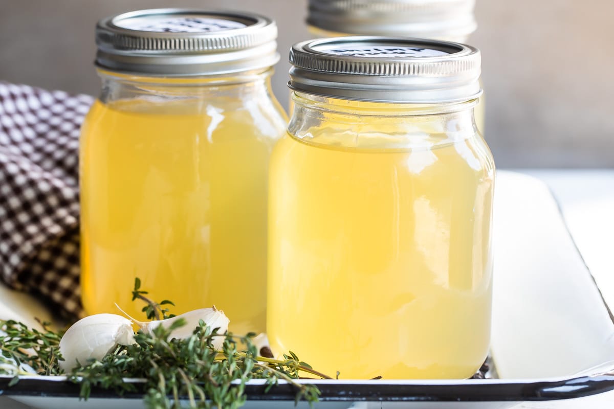 Shrimp stock in mason jars.