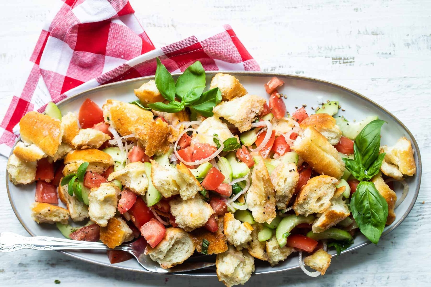 Panzanella salad on a serving platter.