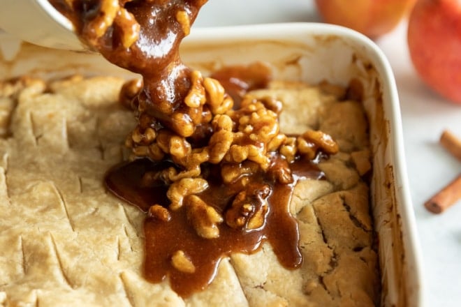 Apple walnut cobbler in a baking dish.